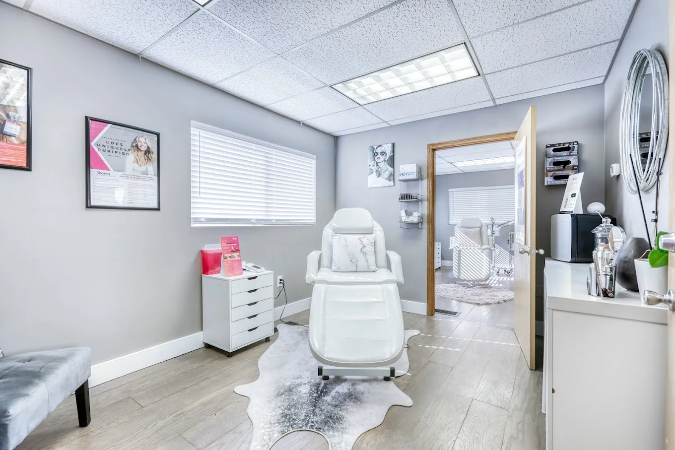 Clean, professional medical spa treatment room with neutral tones at Roxy’s Aesthetics in Basalt