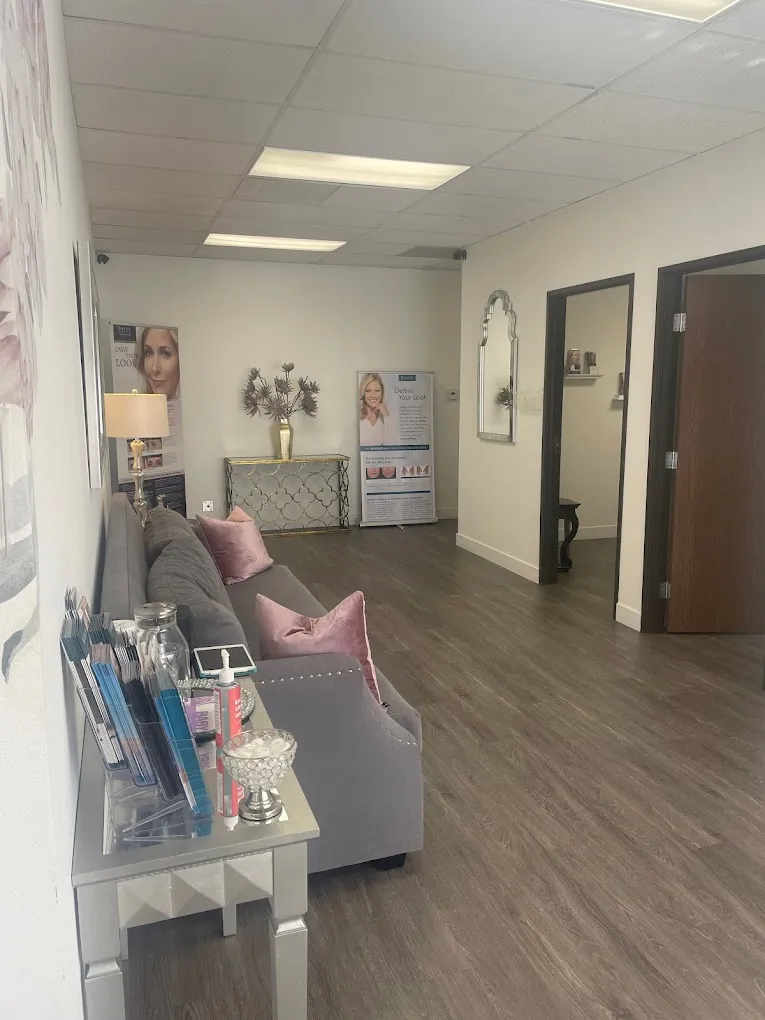 Clean, professional medical spa treatment room with neutral tones at ReNU Medspa in Newport Beach