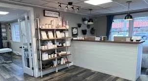 Clean, professional medical spa treatment room with neutral tones at Belle Piel Aesthetics in Farmingville