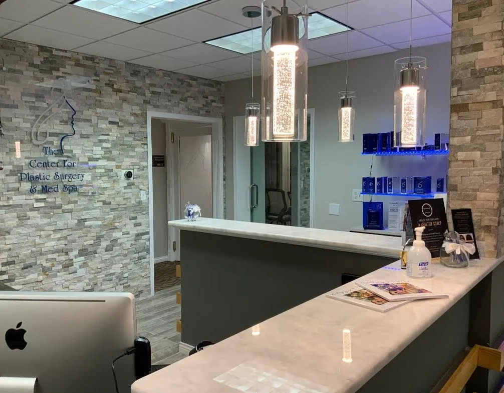 Clean, professional medical spa treatment room with neutral tones at The Center for Plastic Surgery in Lexington