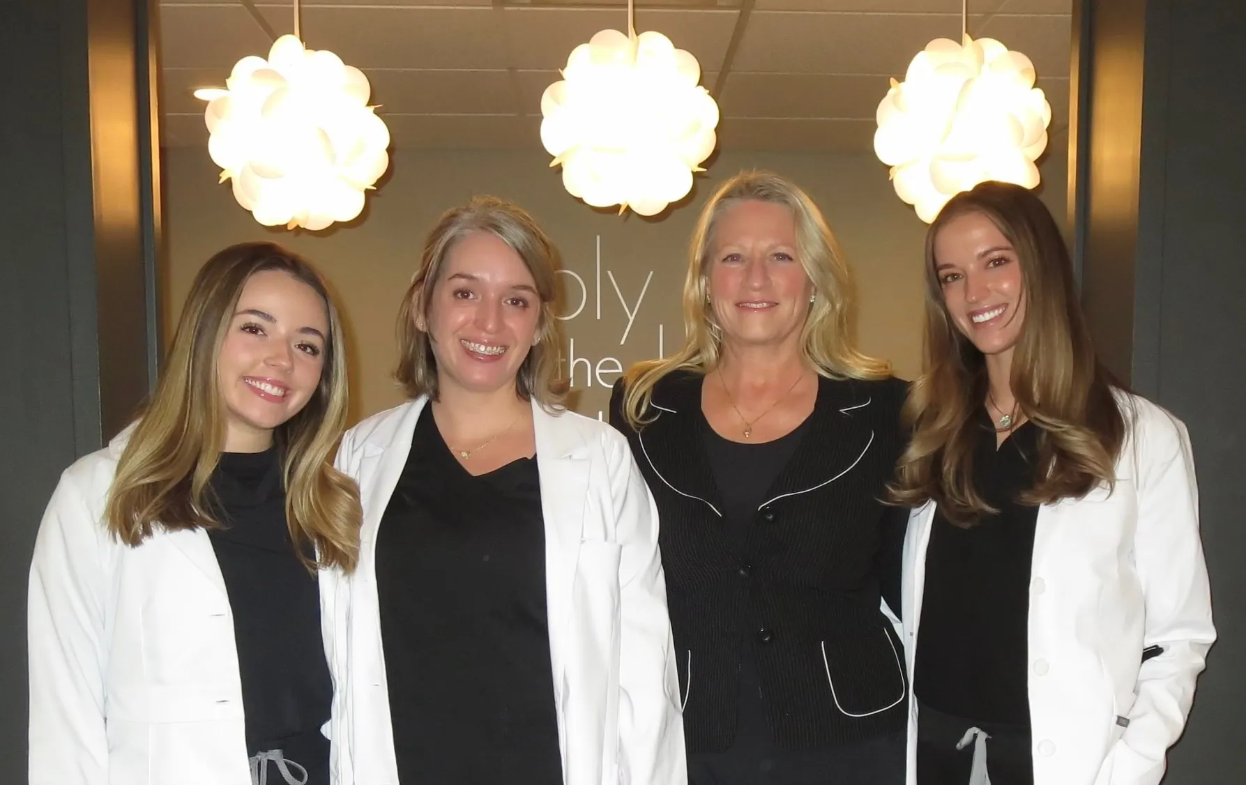Clean, professional medical spa treatment room with neutral tones at Simply The Best Aesthetics in Grand Rapids