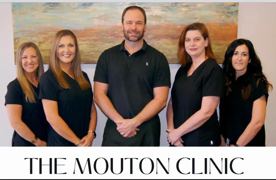 Clean, professional medical spa treatment room with neutral tones at The Mouton Clinic in Baker