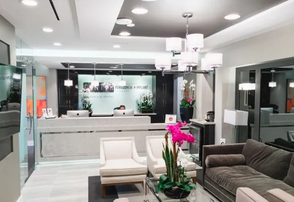 Clean, professional medical spa treatment room with neutral tones at Cntr For Adv Perio&Implant Therapy in Los Angeles