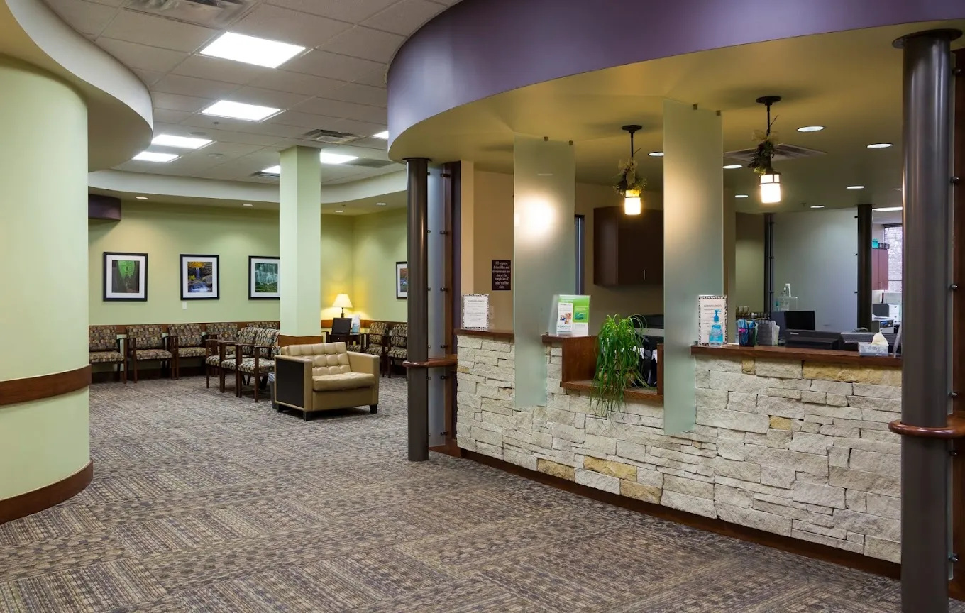 Clean, professional medical spa treatment room with neutral tones at Ozark Dermatology Aesthetics in Fayetteville