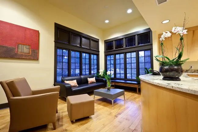 Clean, professional medical spa treatment room with neutral tones at Esthetics Center for Dermatology in Charlotte