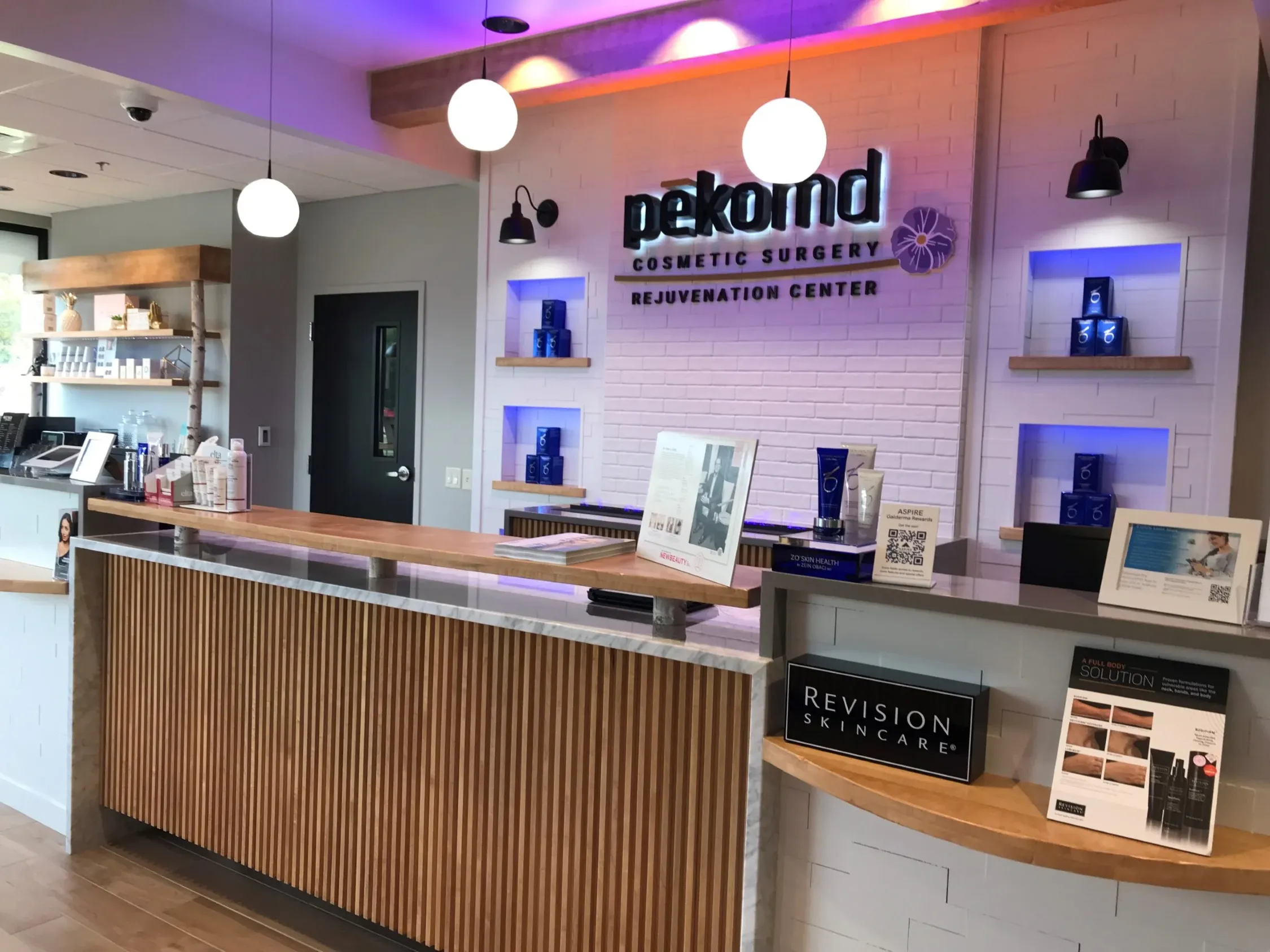 Clean, professional medical spa treatment room with neutral tones at pēkoMD: Peter Koltz, MD in Toledo