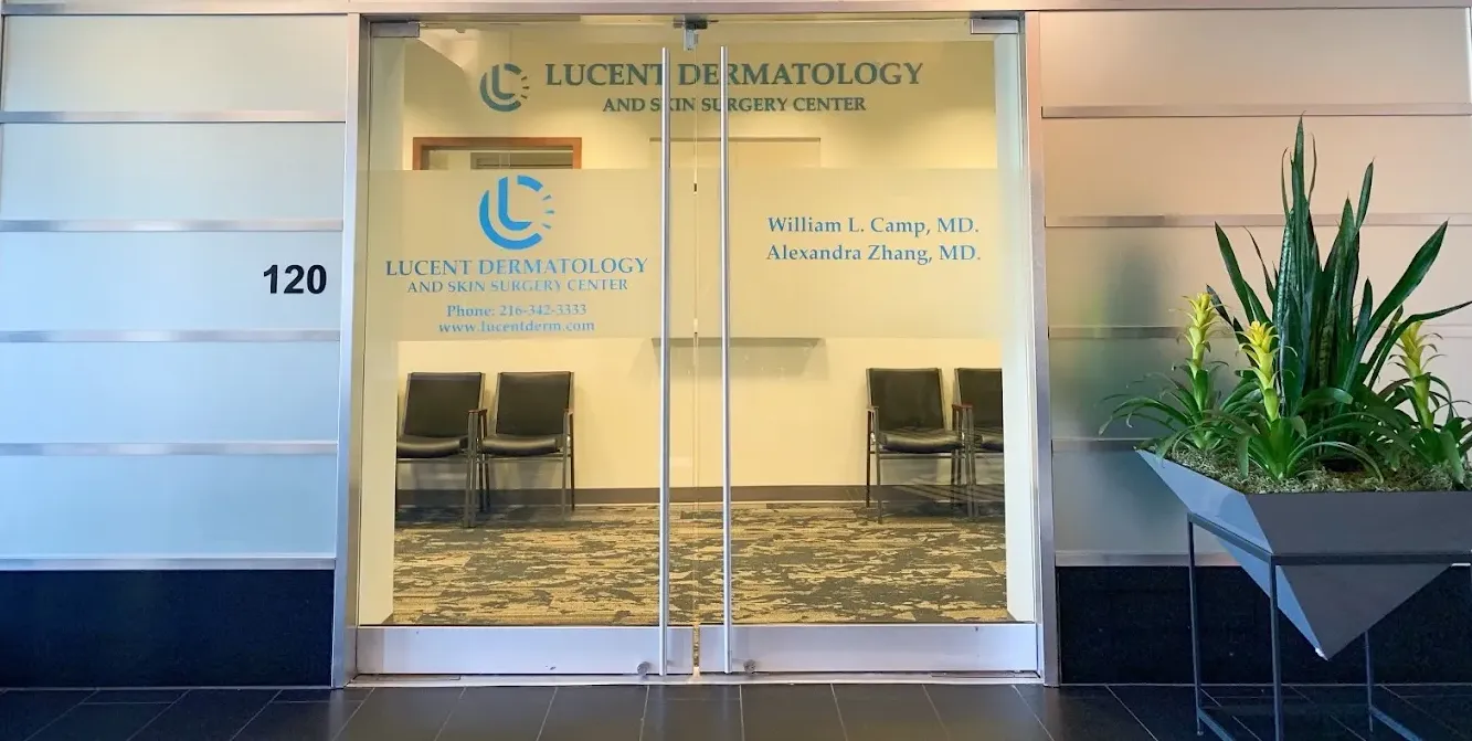 Clean, professional medical spa treatment room with neutral tones at Lucent Dermatology in Beachwood