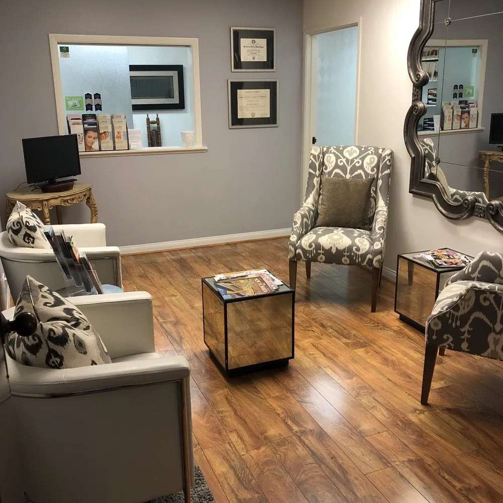 Clean, professional medical spa treatment room with neutral tones at Katharine Nitta MD in Newport Beach