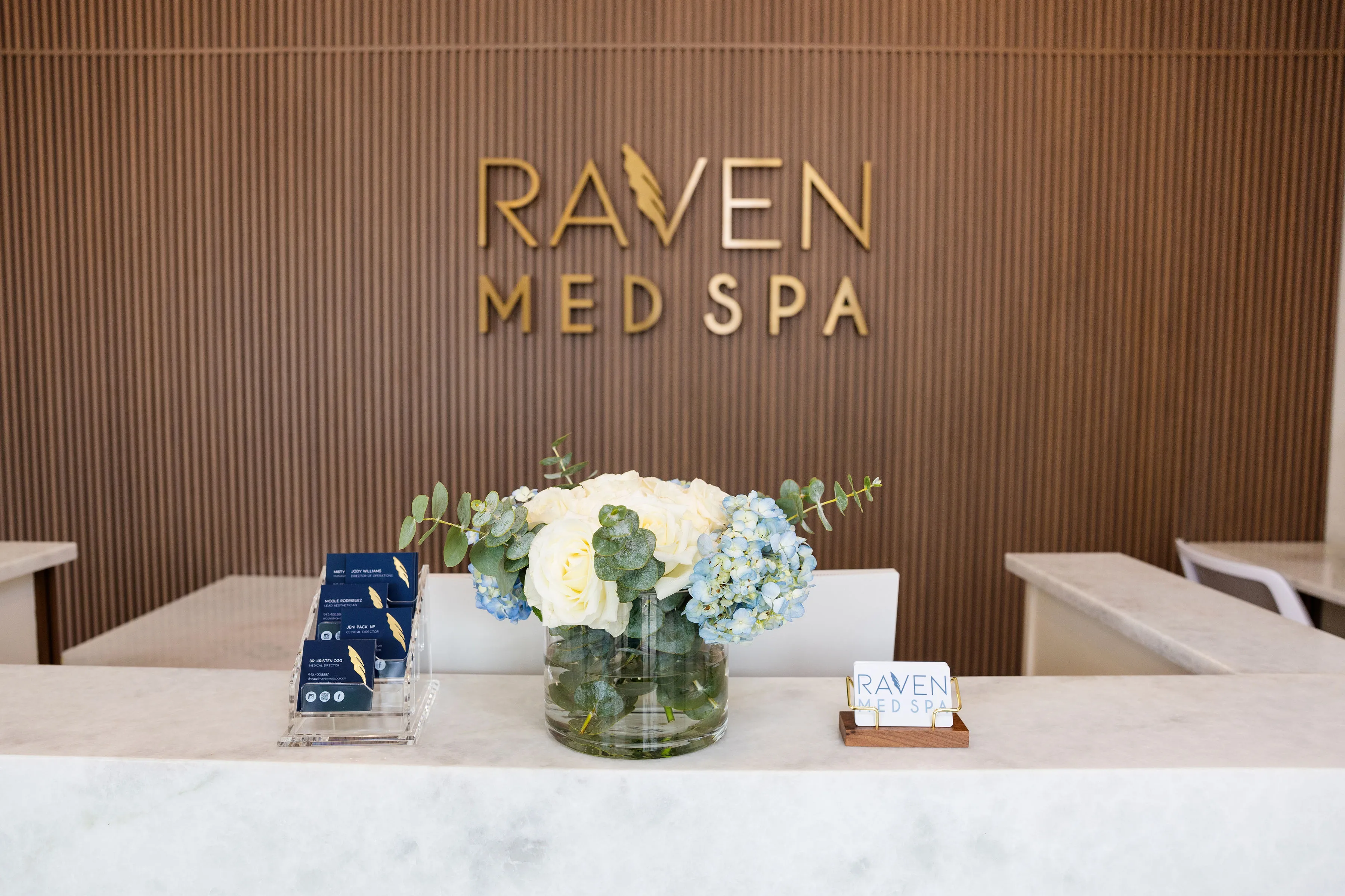 Clean, professional medical spa treatment room with neutral tones at Raven Med Spa in Plano