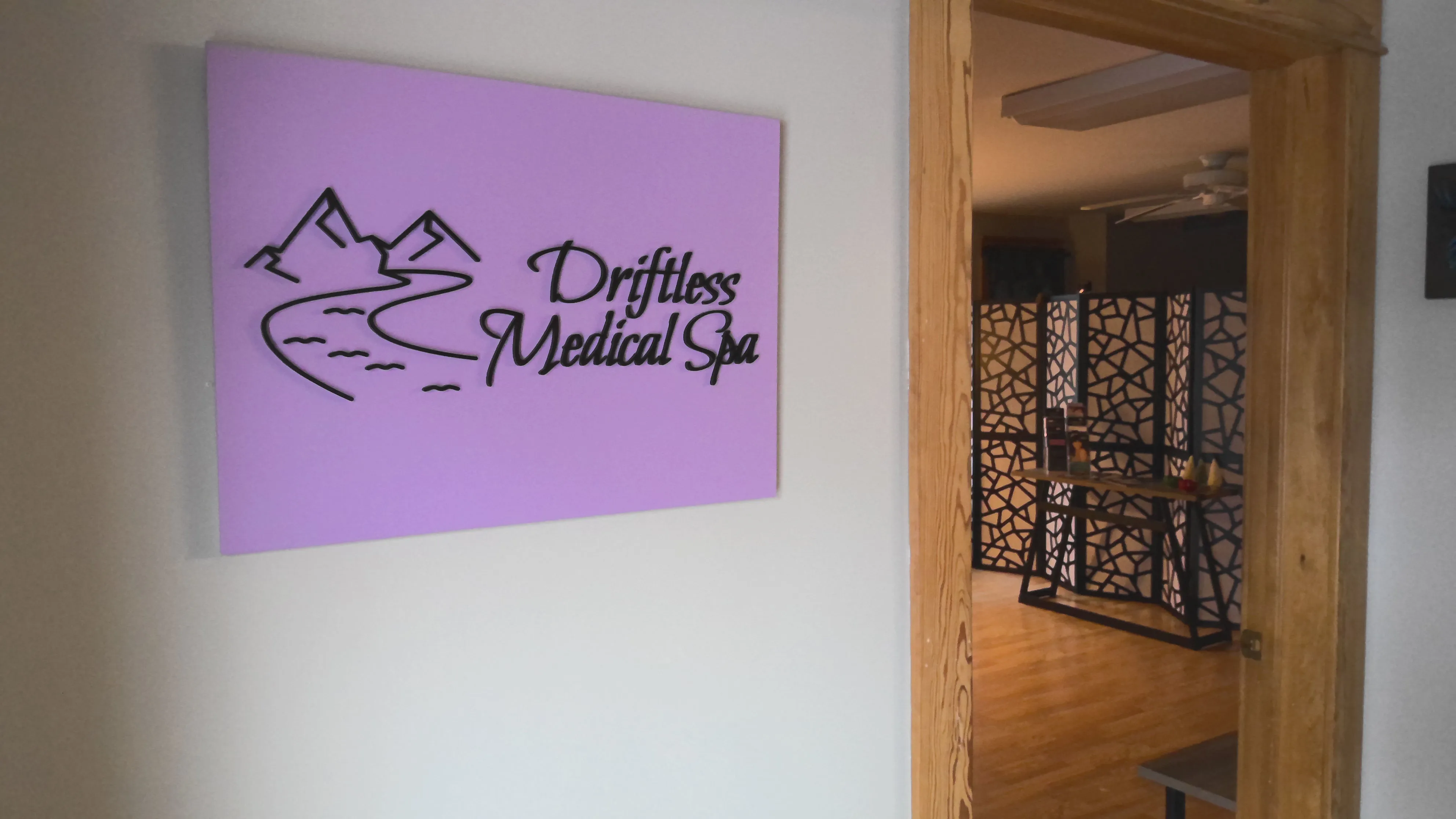 Clean, professional medical spa treatment room with neutral tones at Driftless Medical Spa in Prairie Du Chien