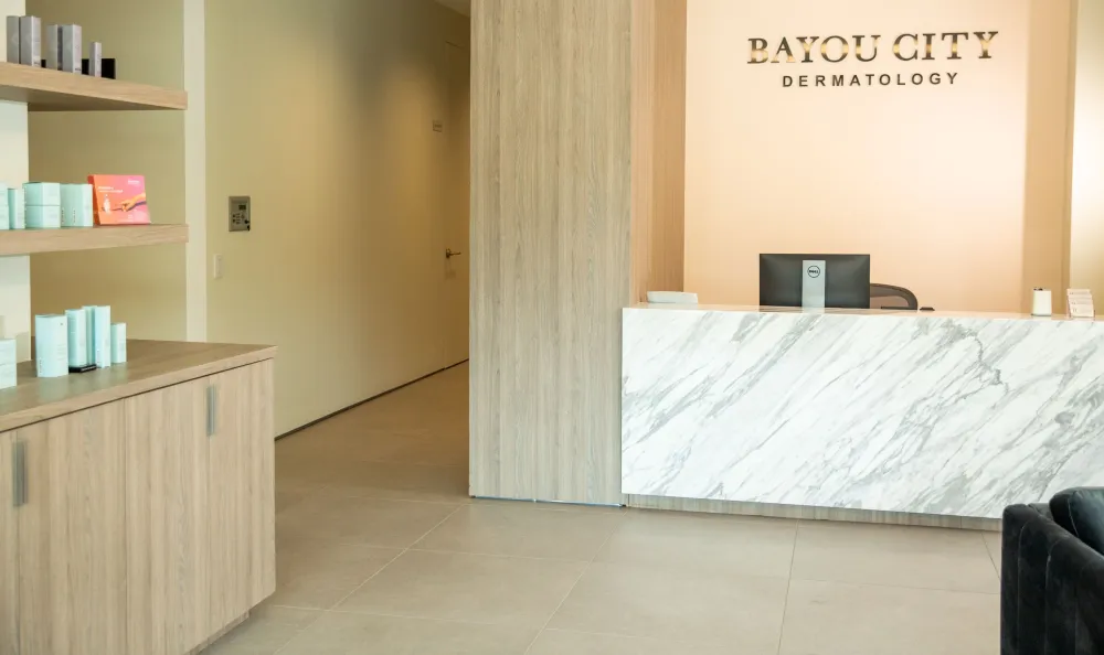 Clean, professional medical spa treatment room with neutral tones at Bayou City Dermatology - River Oaks in Houston