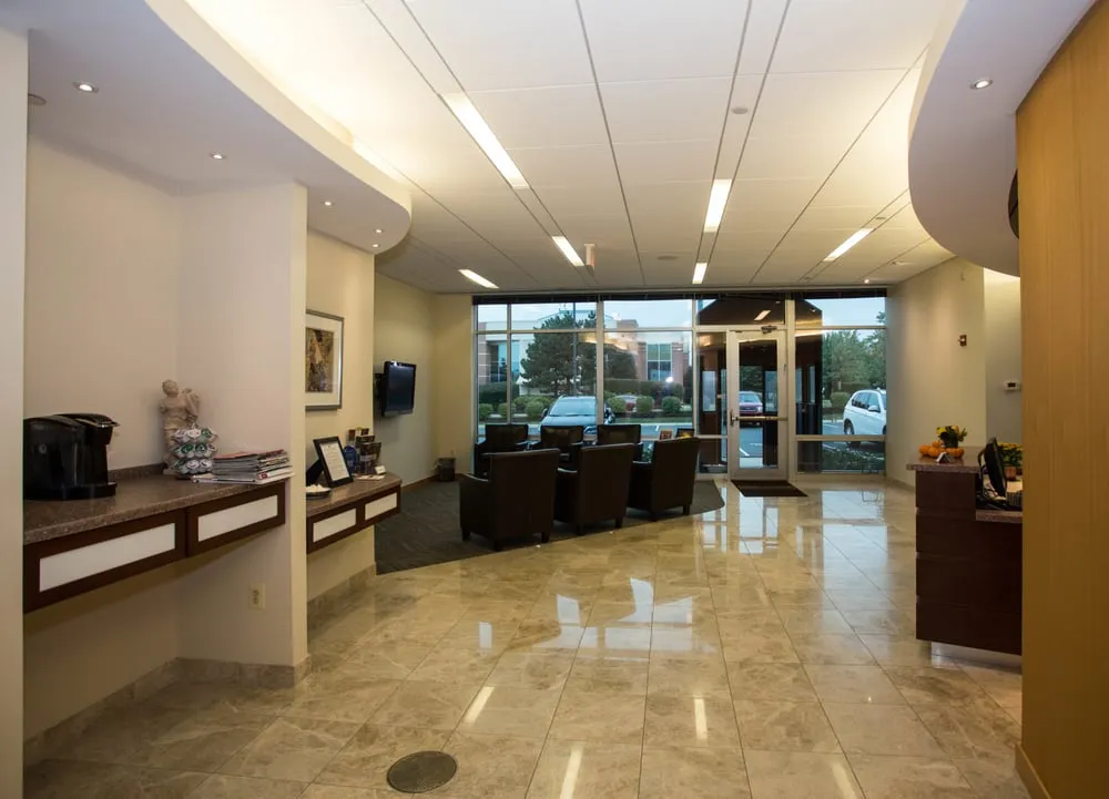Clean, professional medical spa treatment room with neutral tones at The Loudoun Ctr For Plastic Surgery in Ashburn