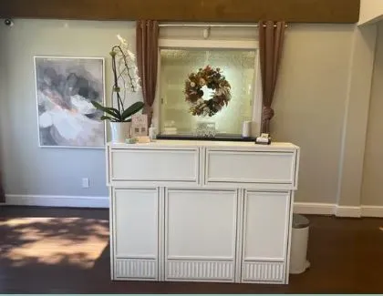 Clean, professional medical spa treatment room with neutral tones at Graceful Beautie Health & Wellness in Advance