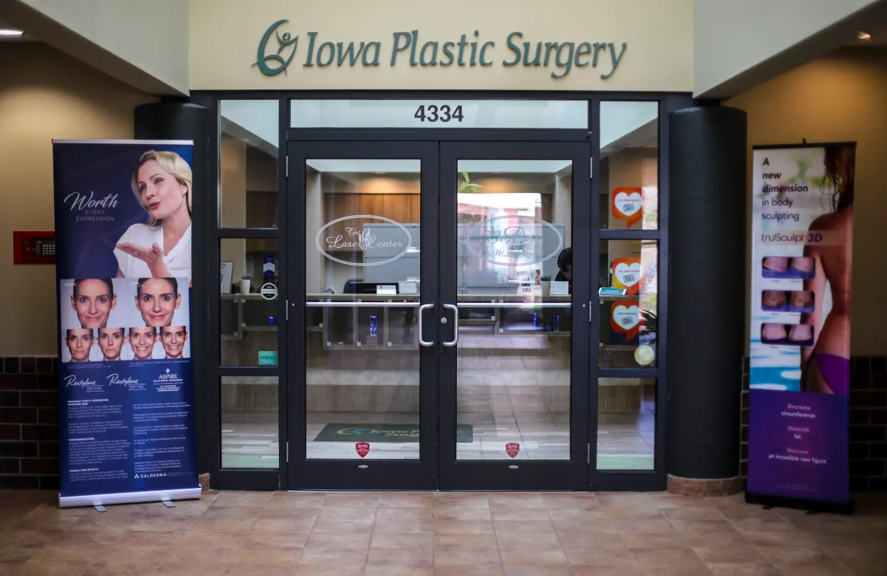 Clean, professional medical spa treatment room with neutral tones at Genesis Plastic Surgery in Davenport