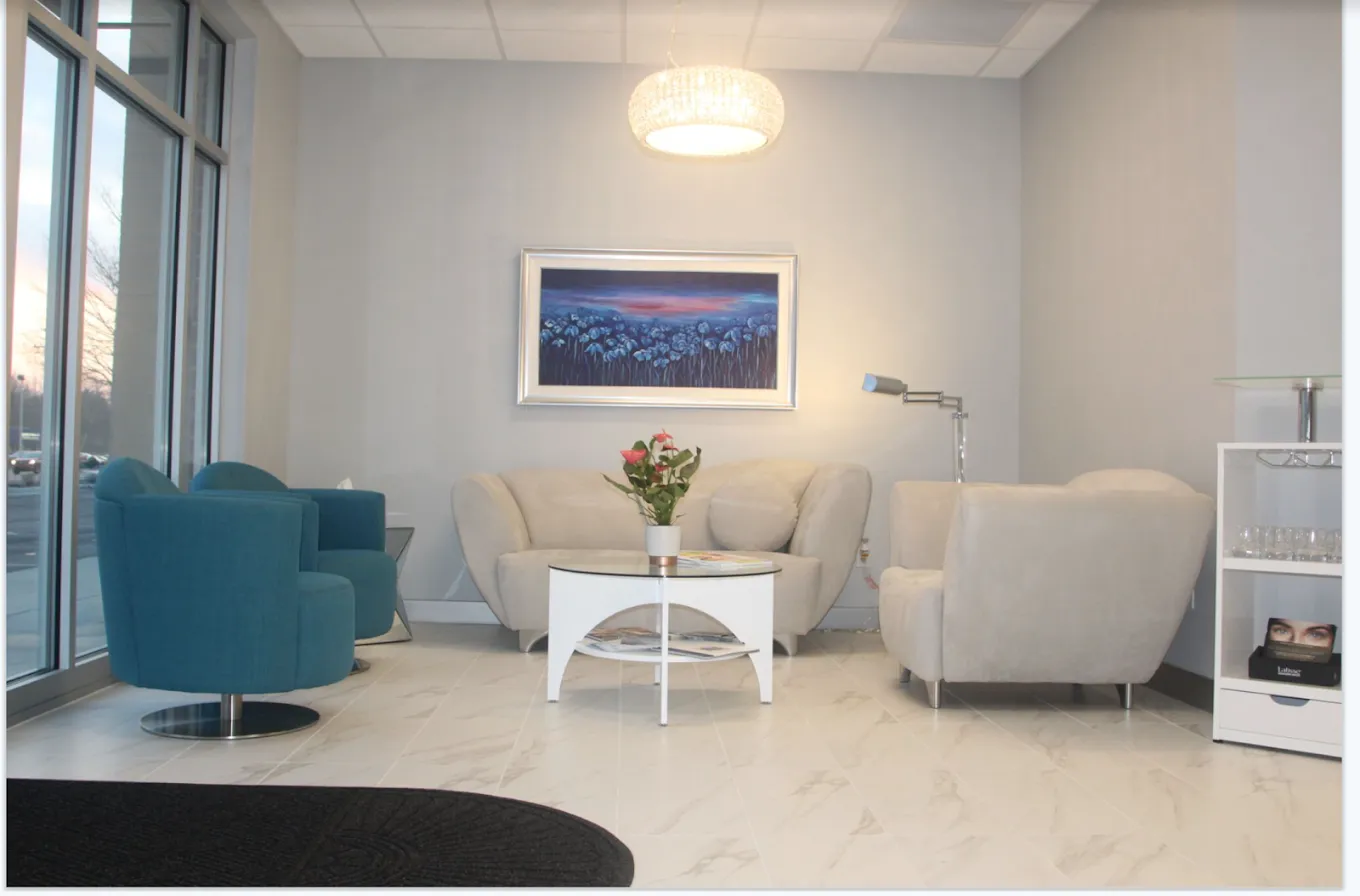 Clean, professional medical spa treatment room with neutral tones at Reflections Medical in Portage