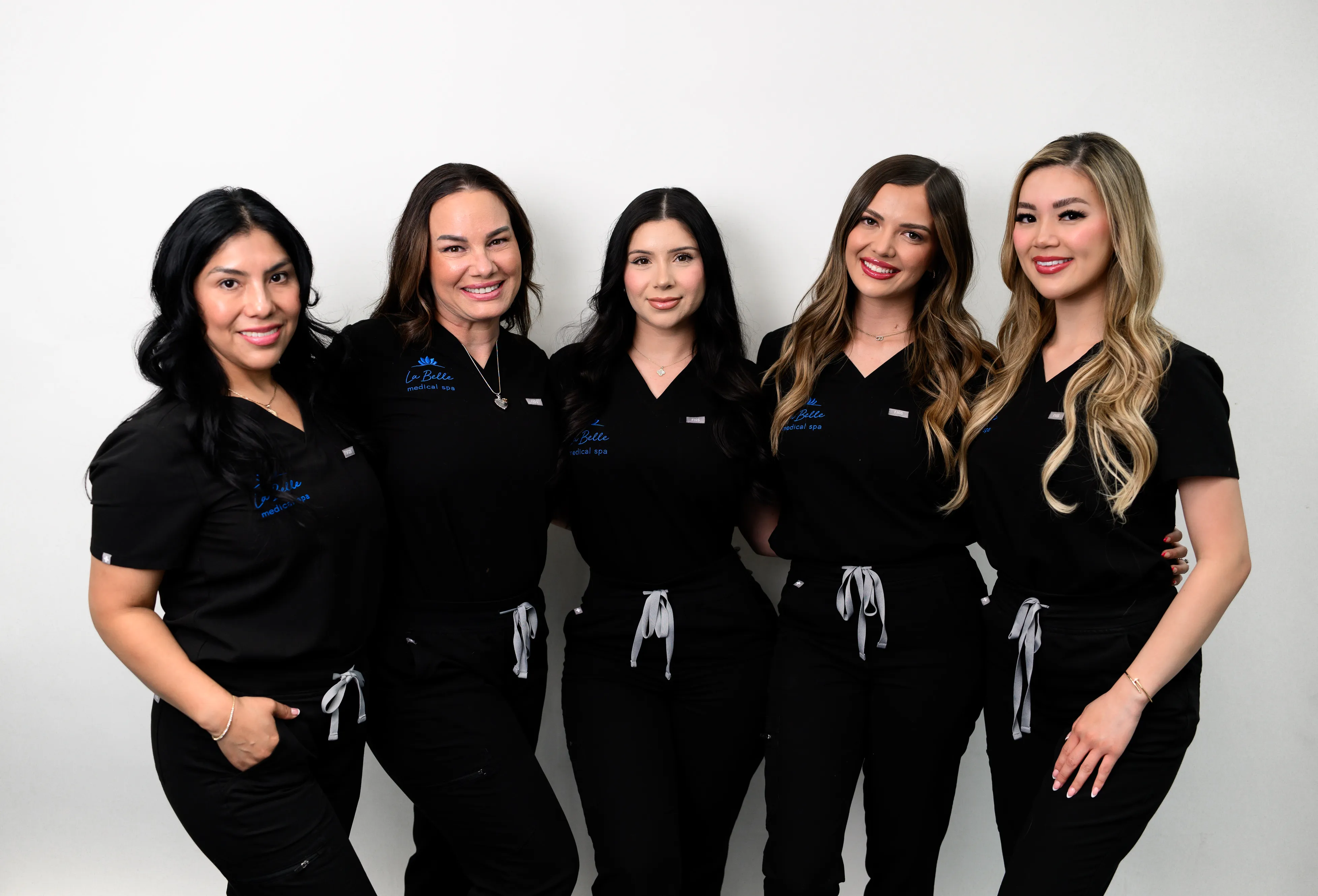 Clean, professional medical spa treatment room with neutral tones at La Belle Medical Spa in Merced