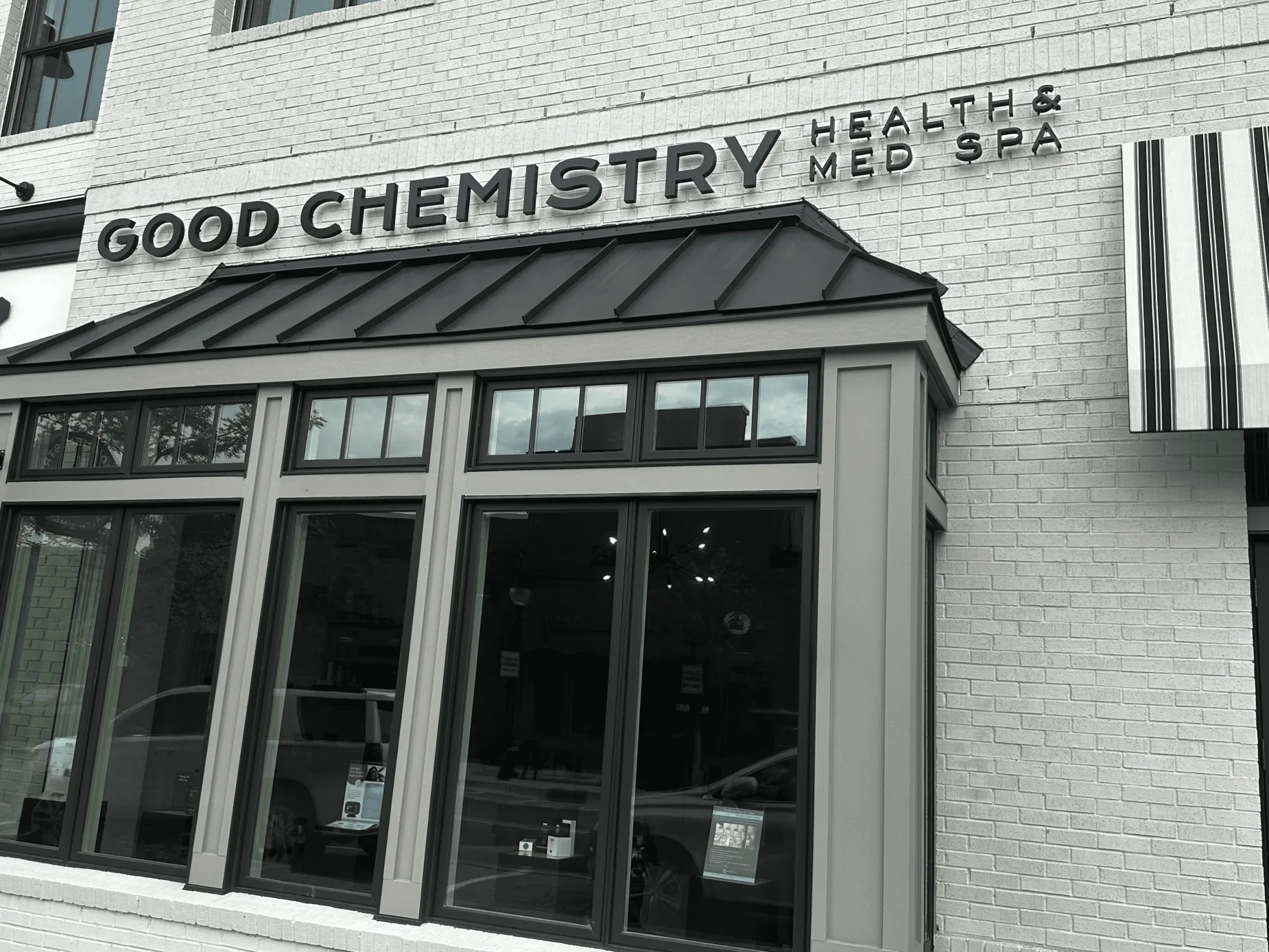 Clean, professional medical spa treatment room with neutral tones at Good Chemistry in Cumming