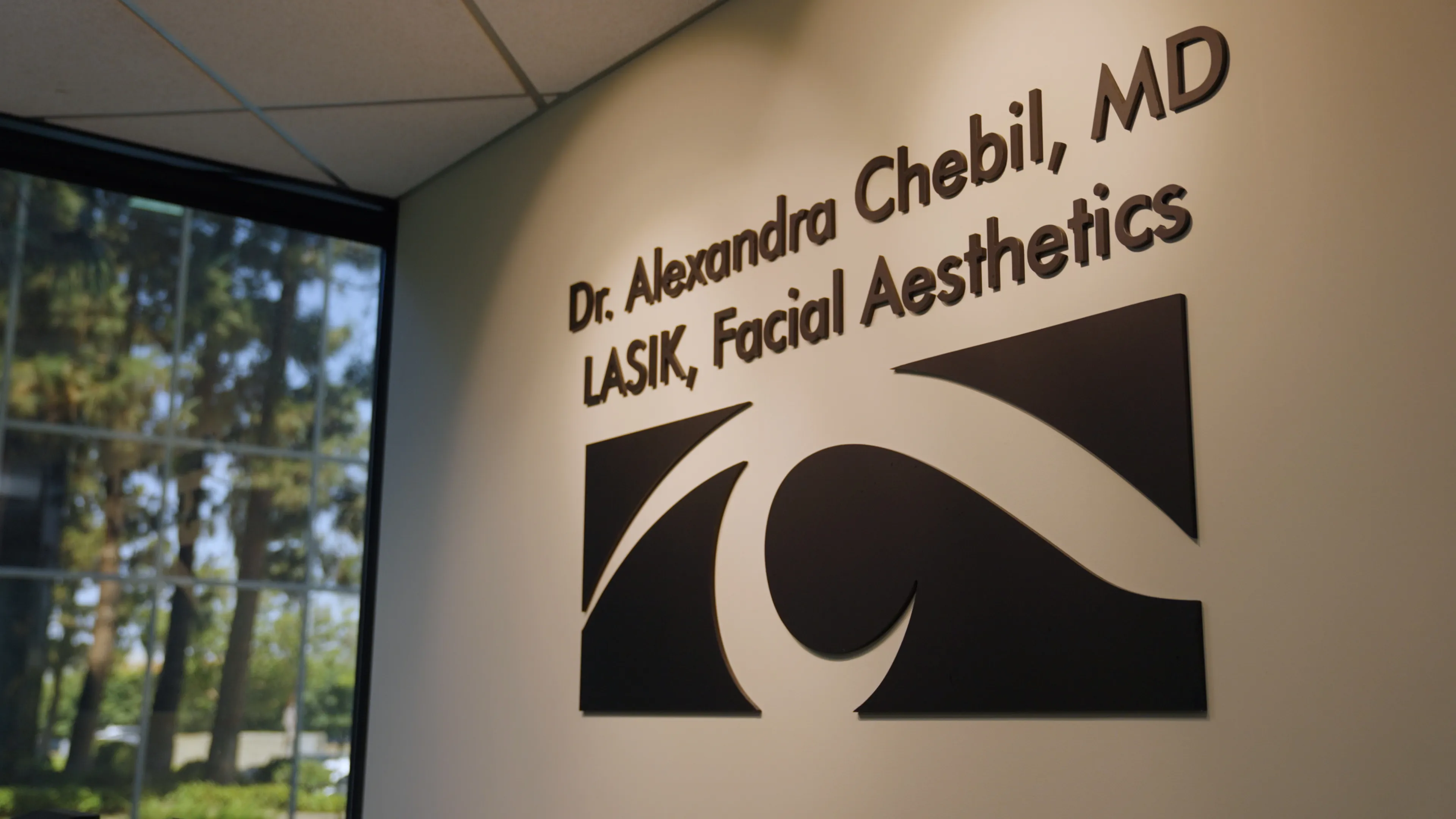 Clean, professional medical spa treatment room with neutral tones at The Lasik Center Medical Group in Newport Beach