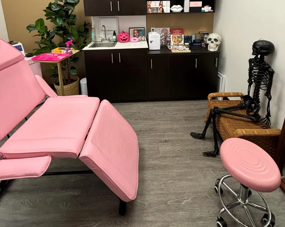 Clean, professional medical spa treatment room with neutral tones at Tatiana Masone in Port Jefferson Station