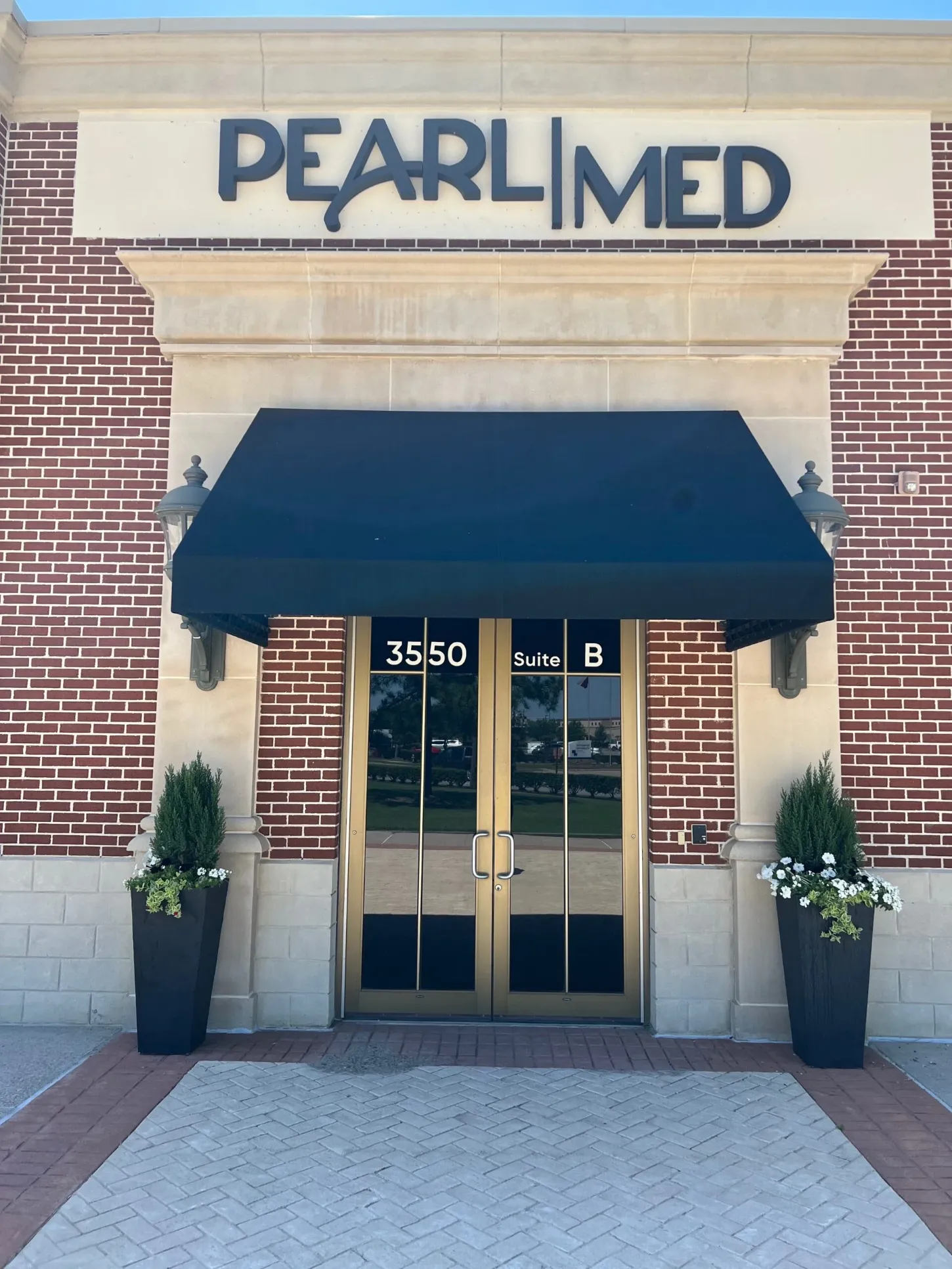 Clean, professional medical spa treatment room with neutral tones at Pearl Med Aesthetics in Beaumont