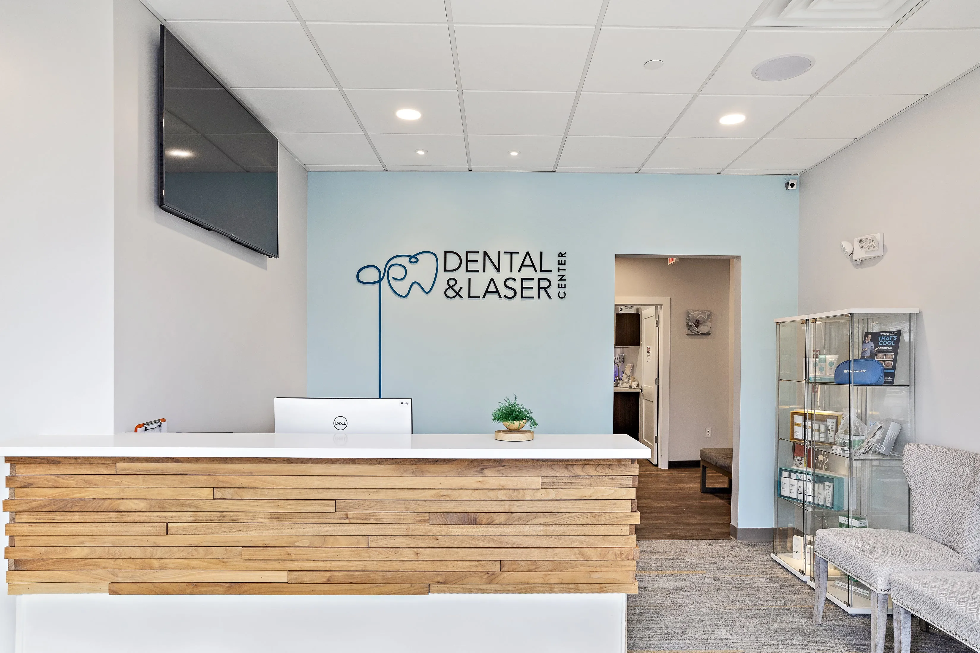 Clean, professional medical spa treatment room with neutral tones at AP Dental & Laser Center in East Boston