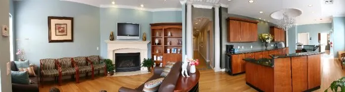 Clean, professional medical spa treatment room with neutral tones at All About Aesthetics in Raleigh