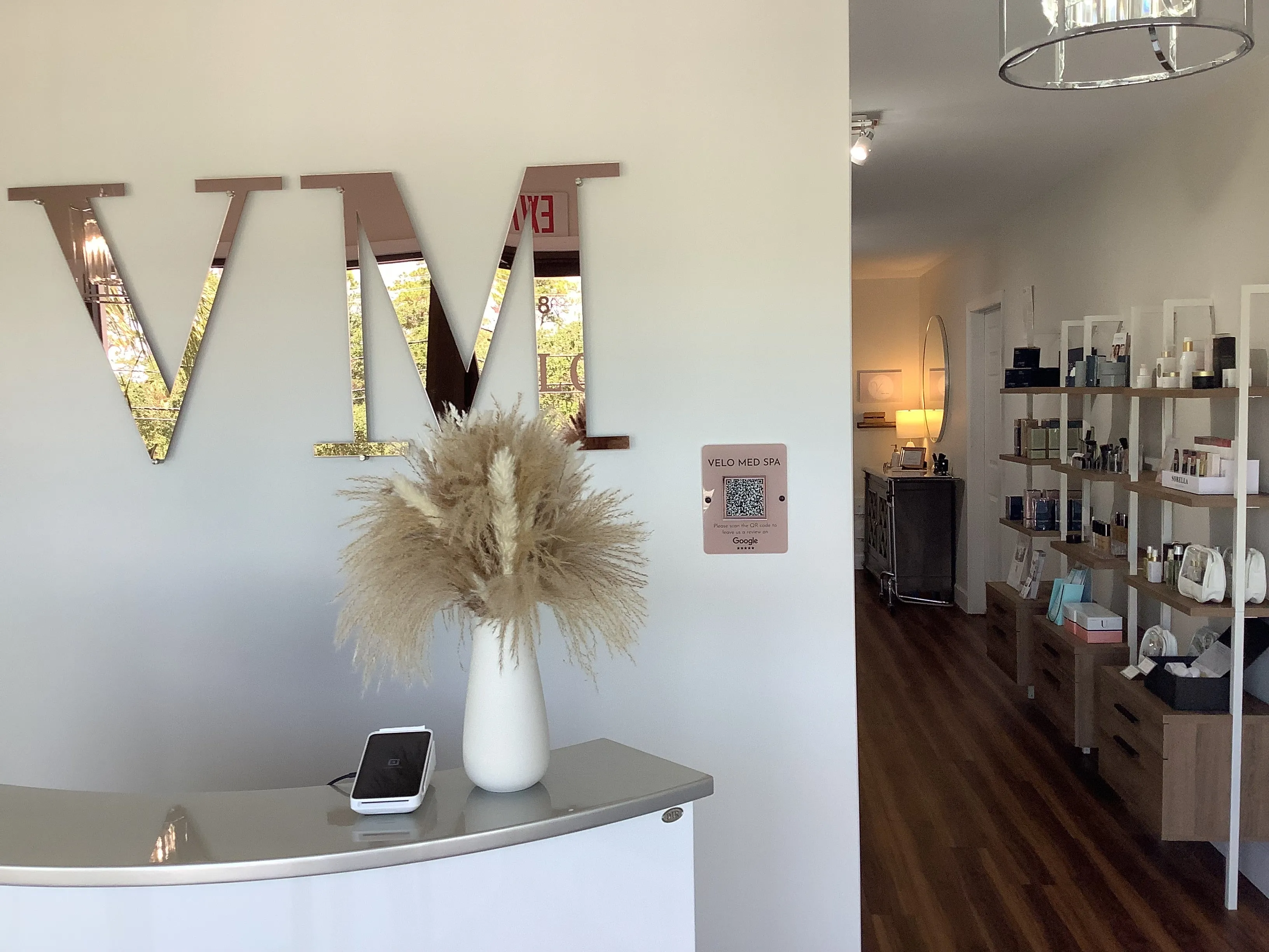 Clean, professional medical spa treatment room with neutral tones at Velo Aesthetic Med Spa in JENSEN BEACH