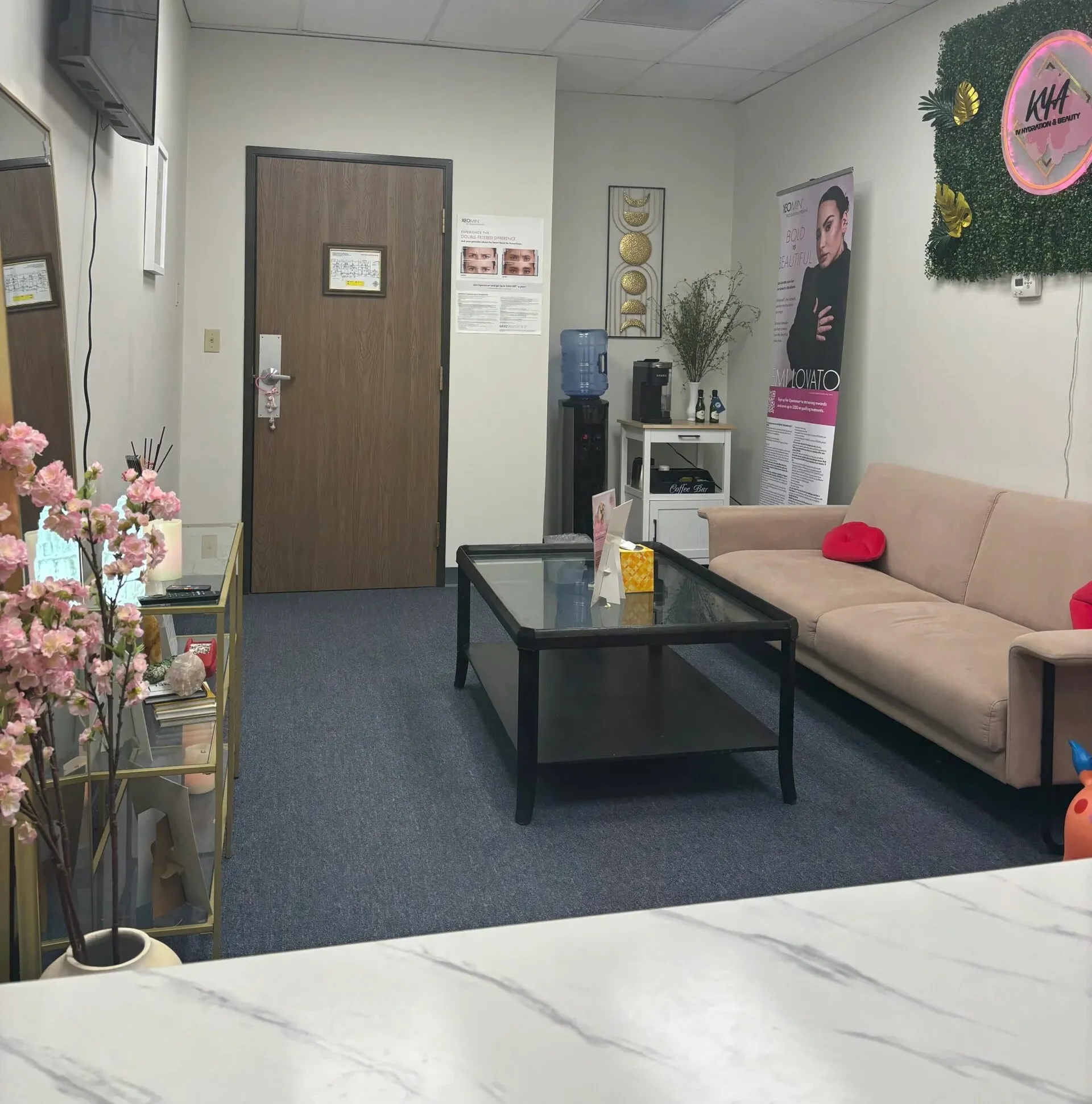 Clean, professional medical spa treatment room with neutral tones at KYA IV & Aesthetics in Denver