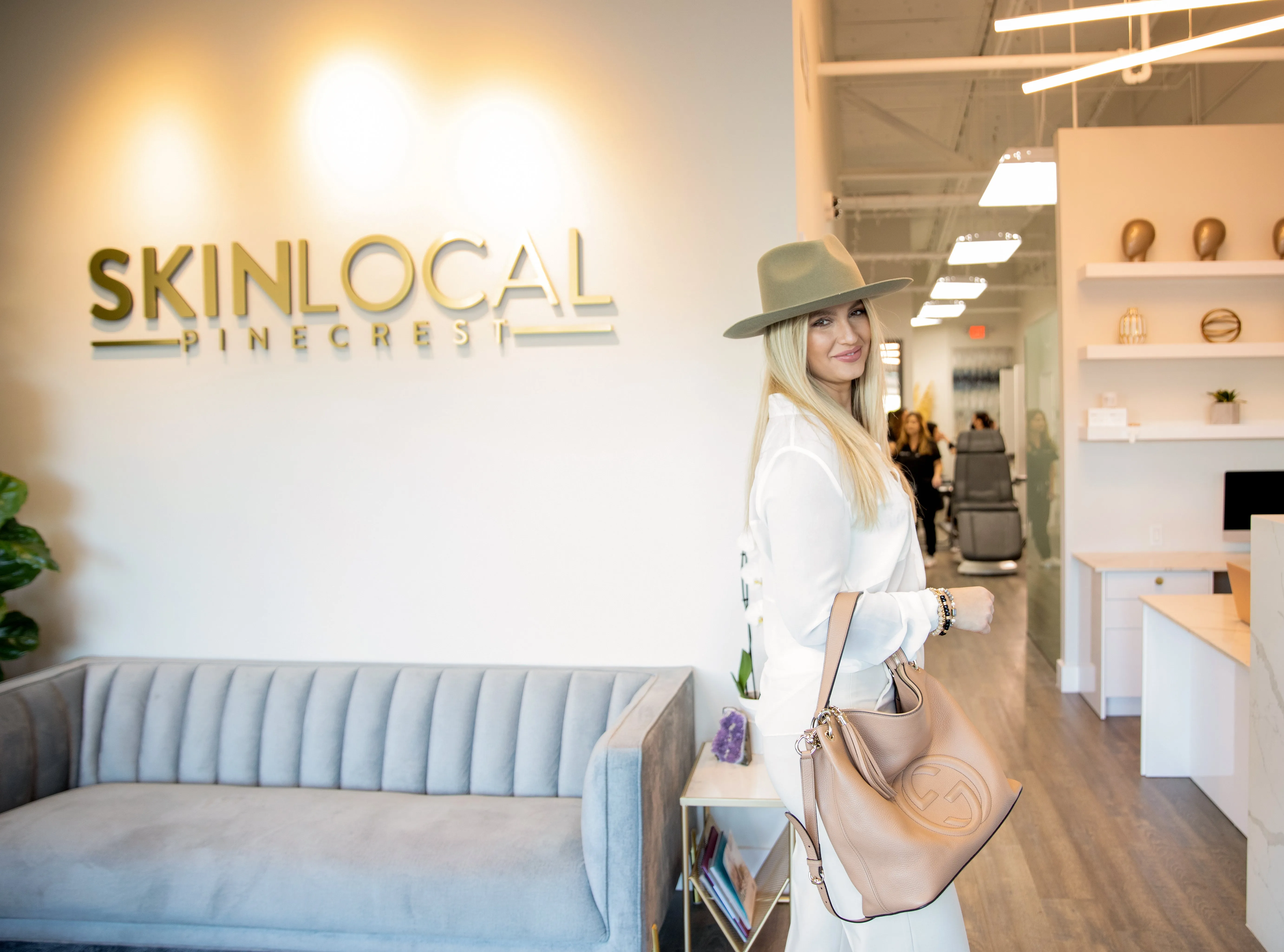 Clean, professional medical spa treatment room with neutral tones at SkinLocal - Pinecrest in Miami