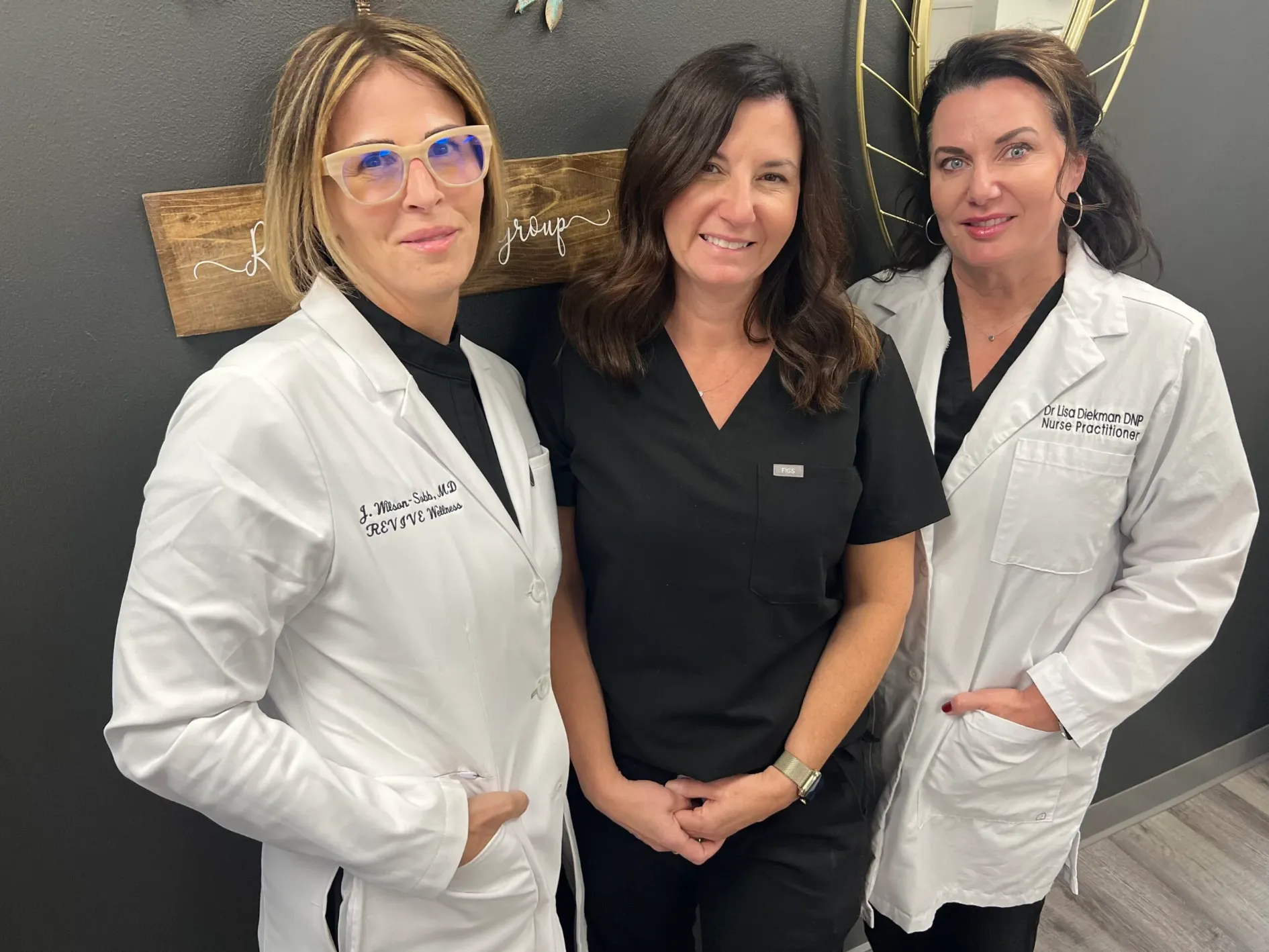 Clean, professional medical spa treatment room with neutral tones at Revive Wellness Group in Perrysburg