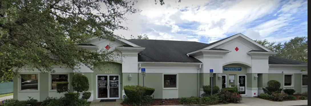 Clean, professional medical spa treatment room with neutral tones at TAJ Medical Aesthetics in Bradenton 