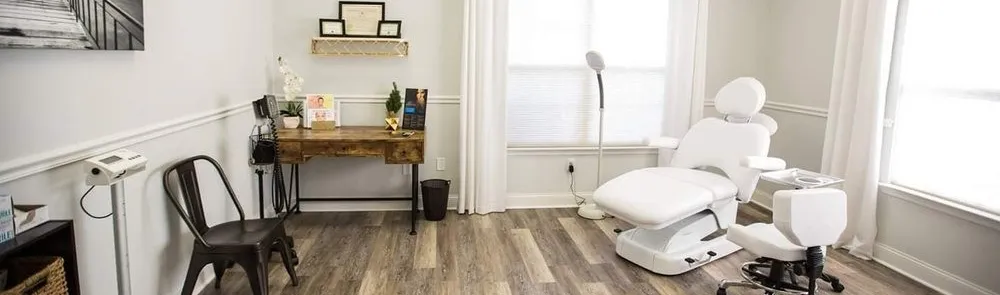Clean, professional medical spa treatment room with neutral tones at Moore Road Medispa in Chattanooga