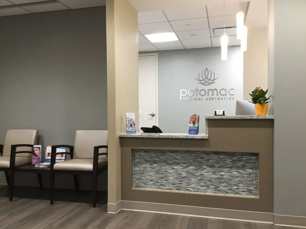 Clean, professional medical spa treatment room with neutral tones at Potomac Medical Aesthetics in Potomac