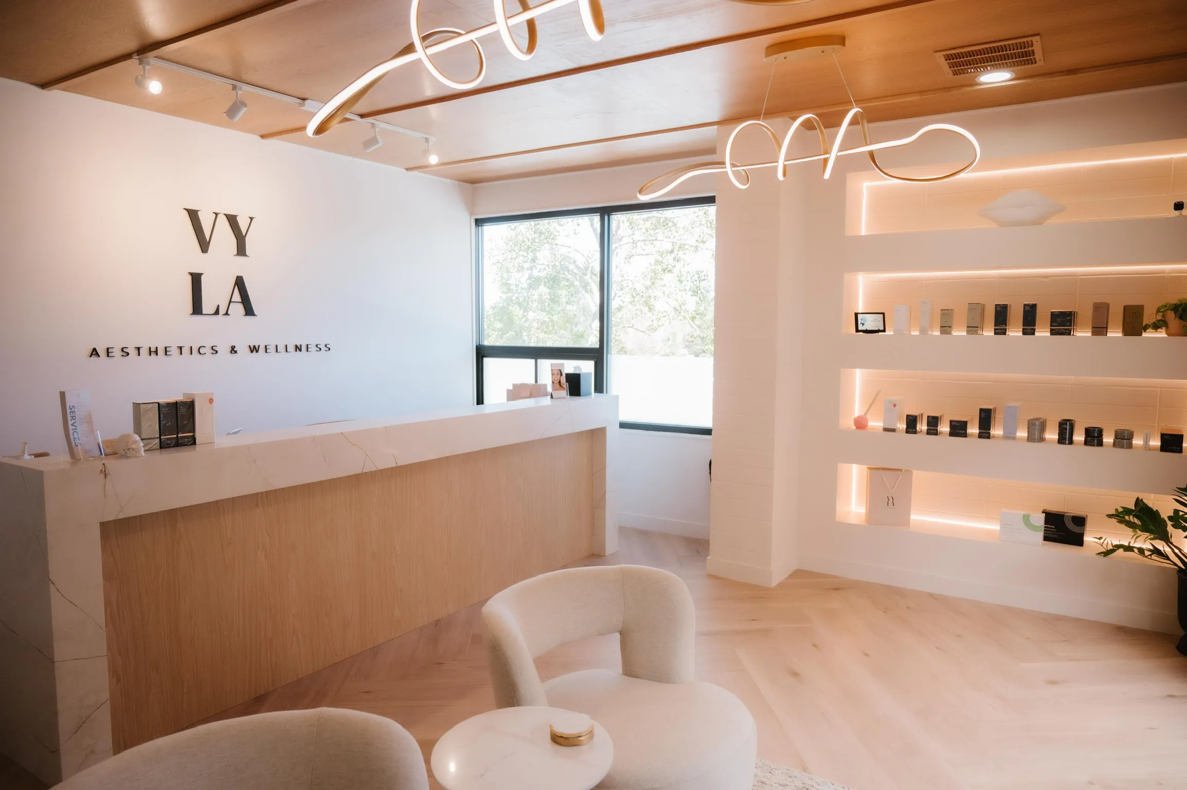 Clean, professional medical spa treatment room with neutral tones at Vyla Aesthetics - Park City, UT in Park City