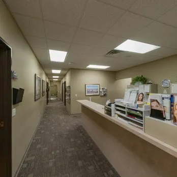 Clean, professional medical spa treatment room with neutral tones at Forefront Dermatology- Neenah in Neenah