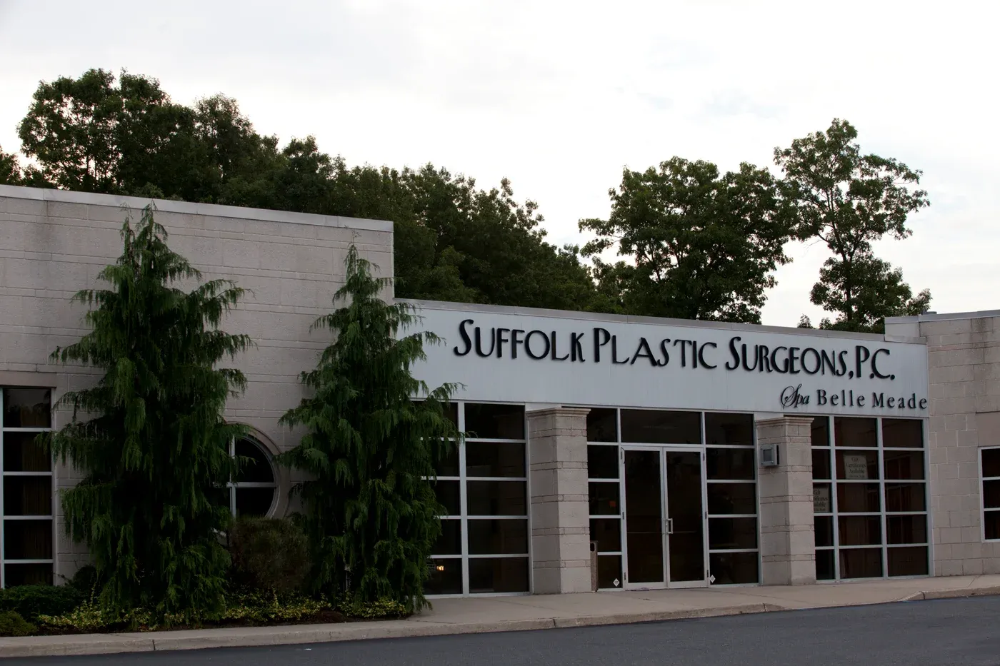 Clean, professional medical spa treatment room with neutral tones at Suffolk Plastic Surgeons PC in East Setauket