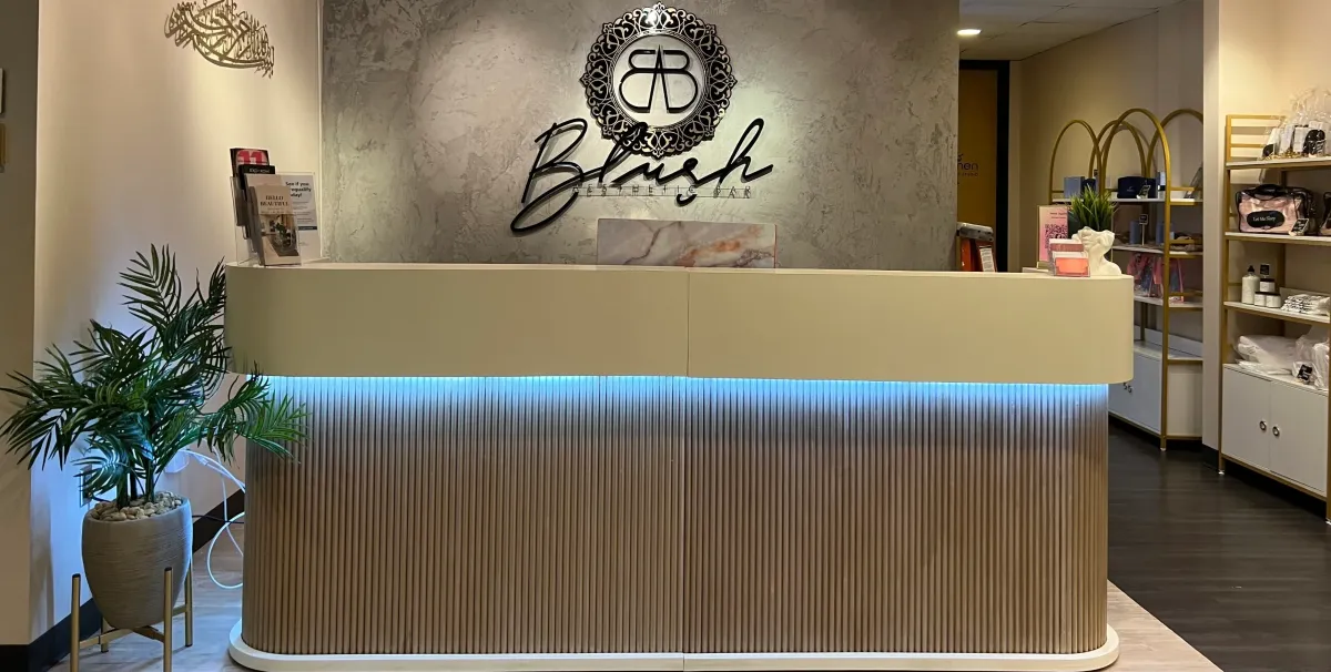 Clean, professional medical spa treatment room with neutral tones at Blush Aesthetic Bar in Overland Park
