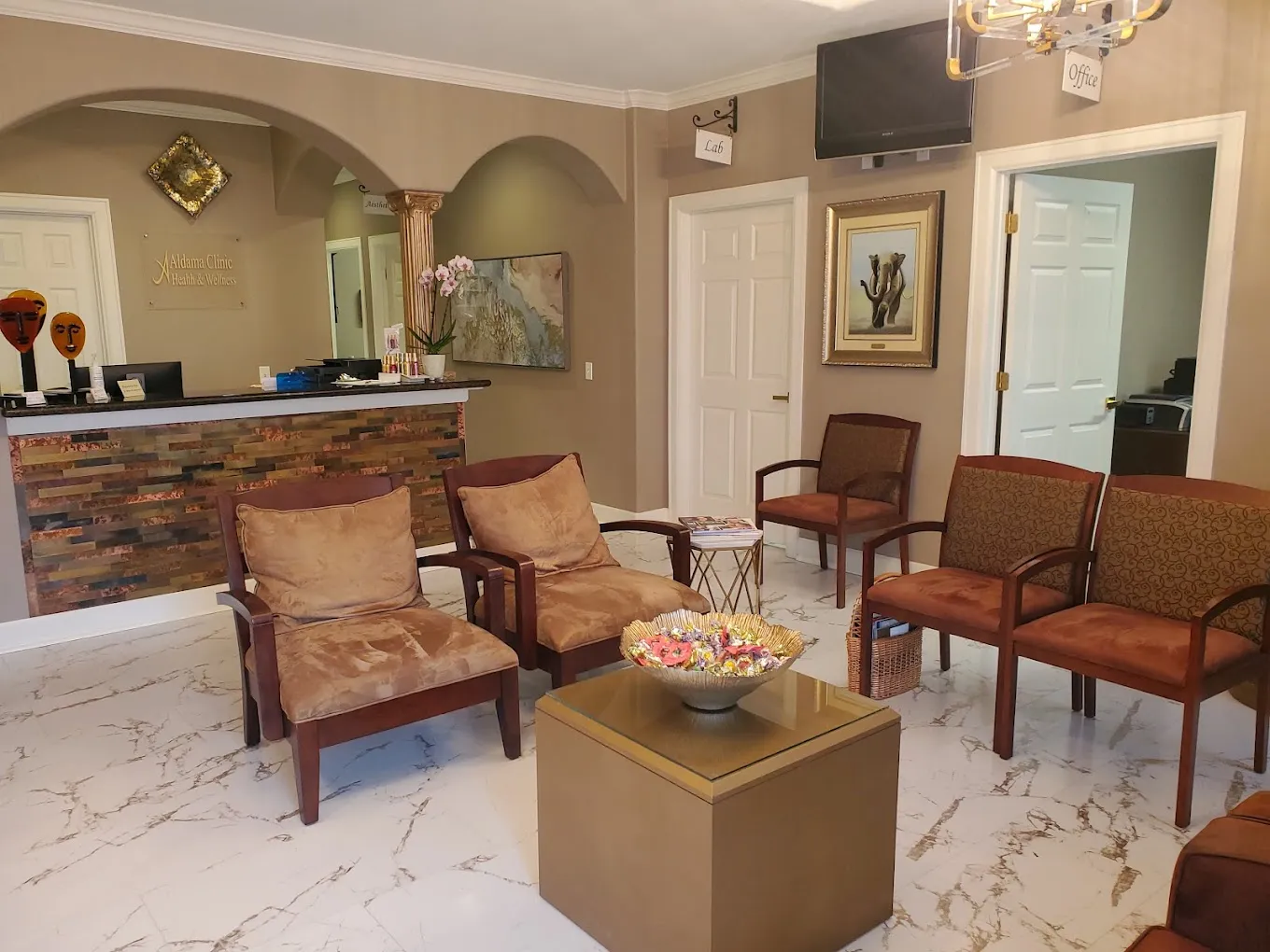 Clean, professional medical spa treatment room with neutral tones at Aesthetic &Acupuncture Clinic of TX in Brenham