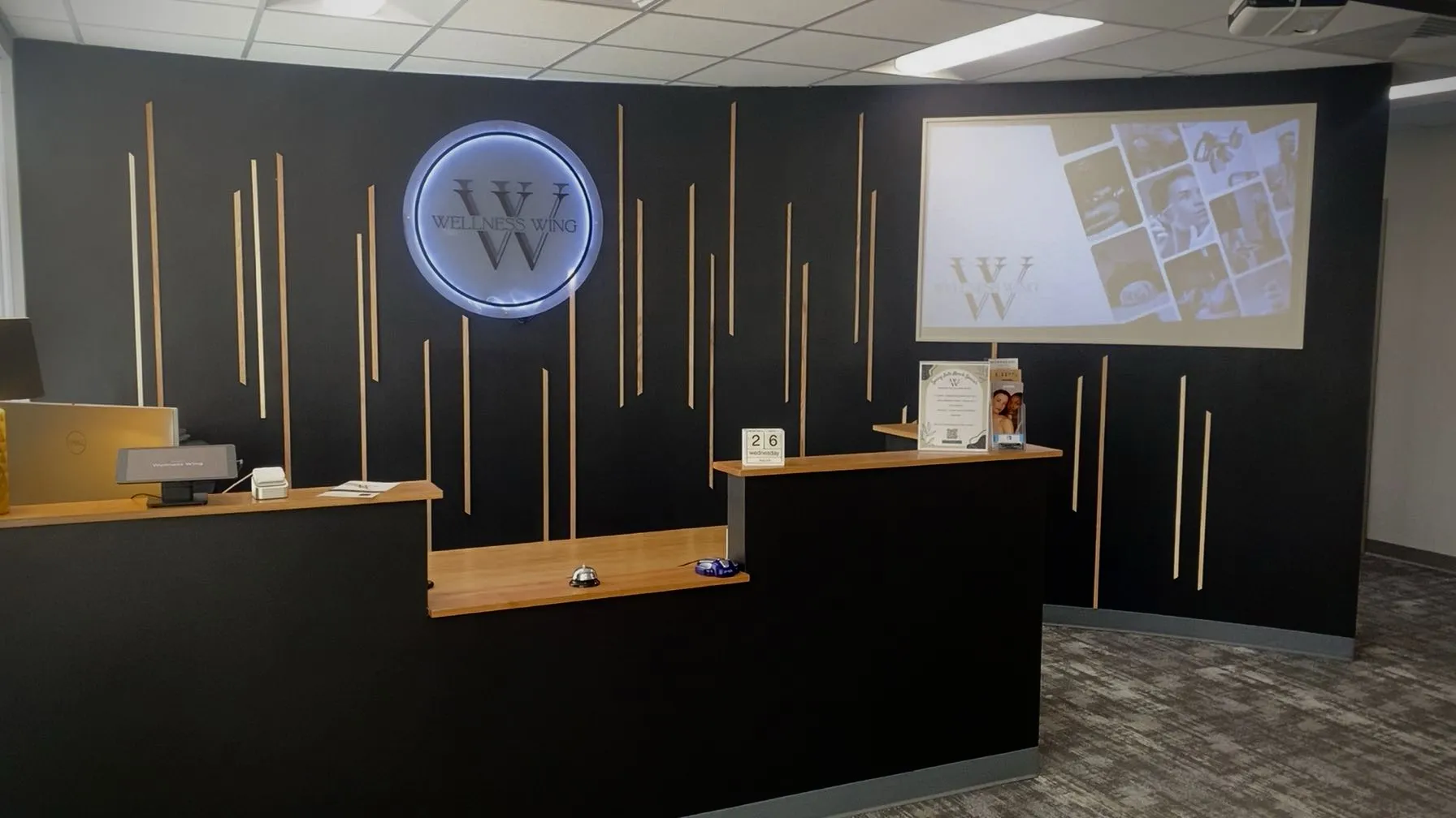 Clean, professional medical spa treatment room with neutral tones at Wellness Wing in Lafayette