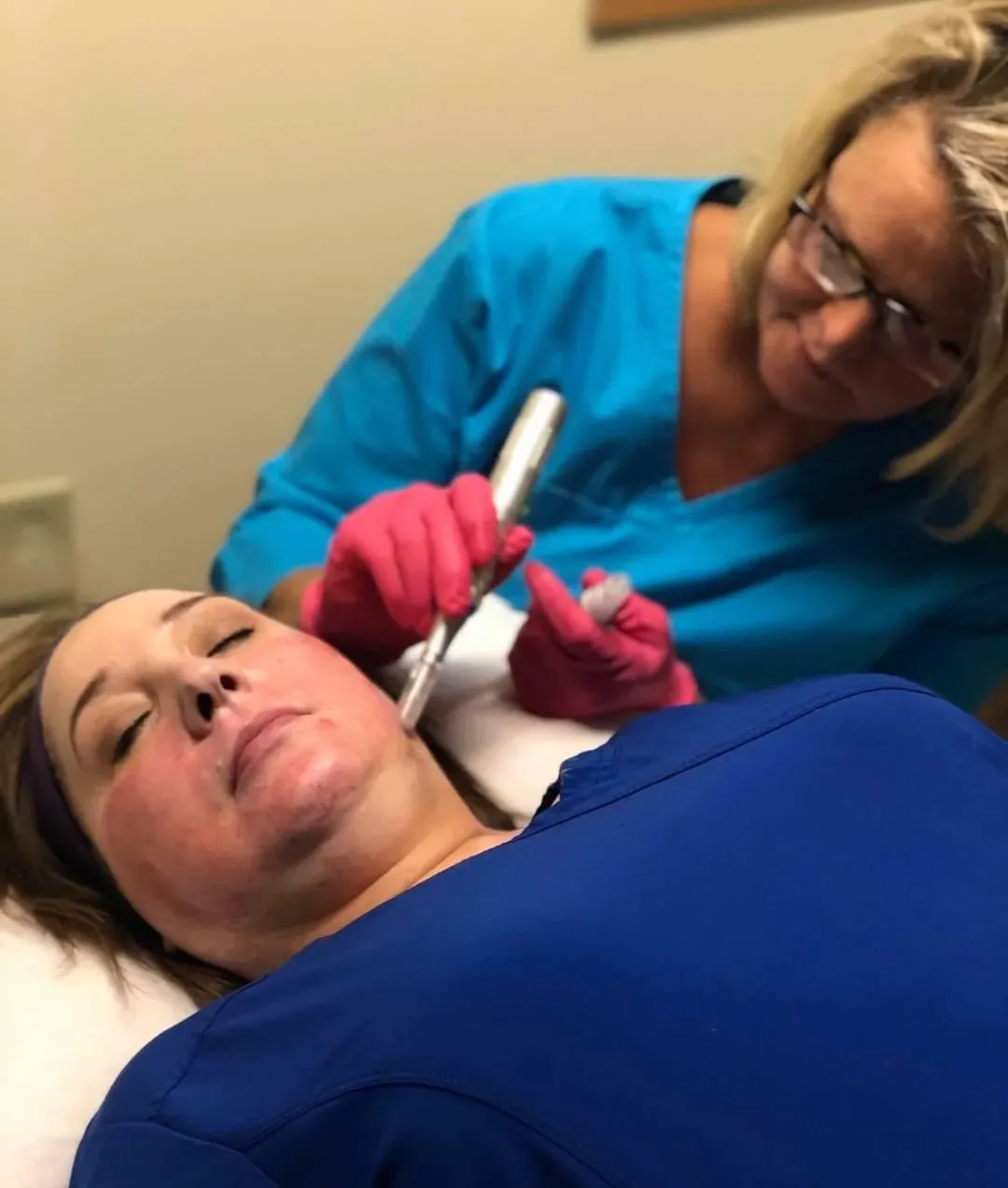 Clean, professional medical spa treatment room with neutral tones at Advanced Aesthetics Med Spa in Troy