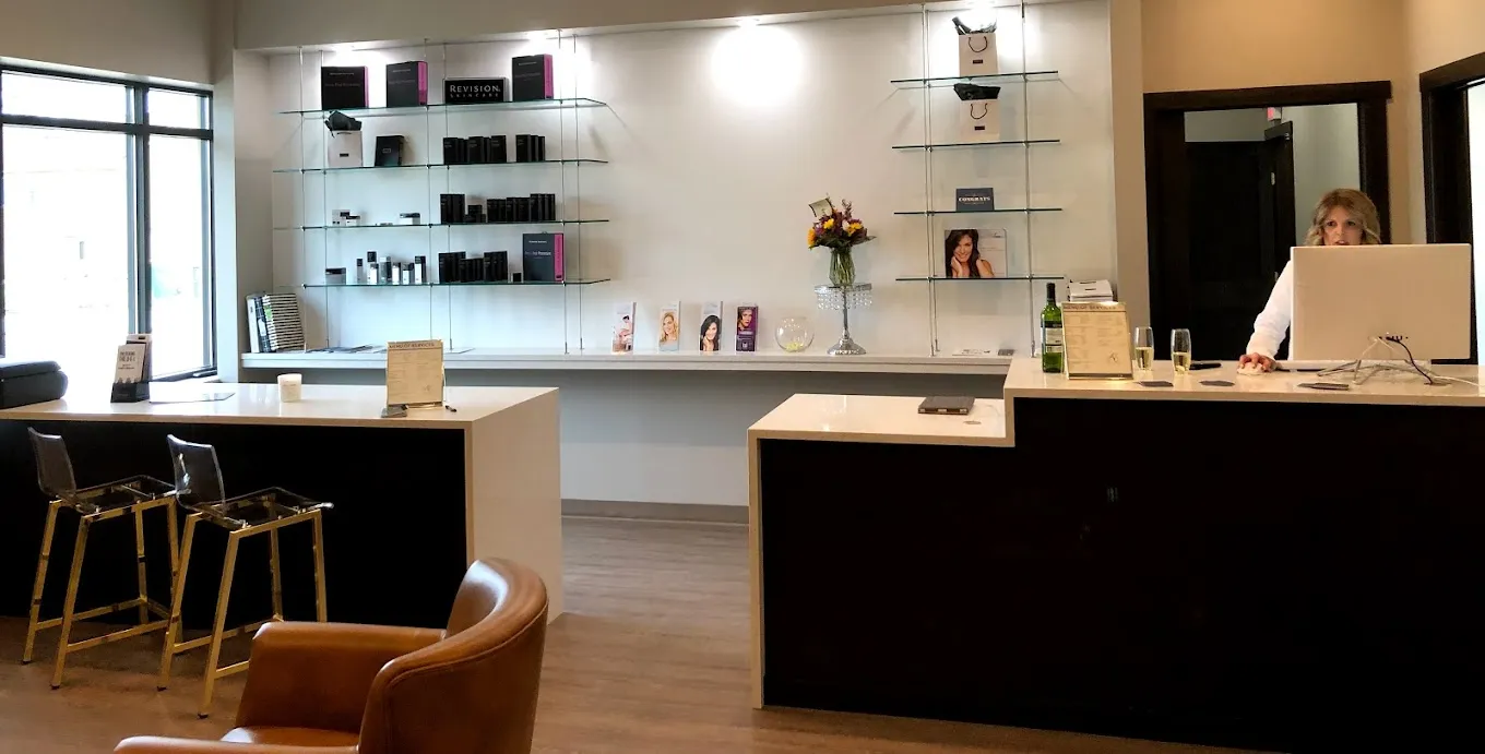 Clean, professional medical spa treatment room with neutral tones at Ageless Esthetics Medspa in Rochester
