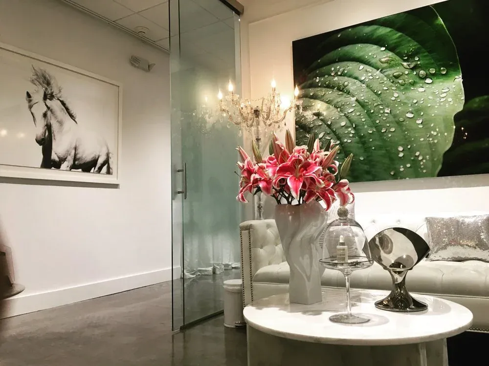 Clean, professional medical spa treatment room with neutral tones at Leonal Calderon, MD in Miami