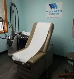 Clean, professional medical spa treatment room with neutral tones at West Derm Center in Bronx