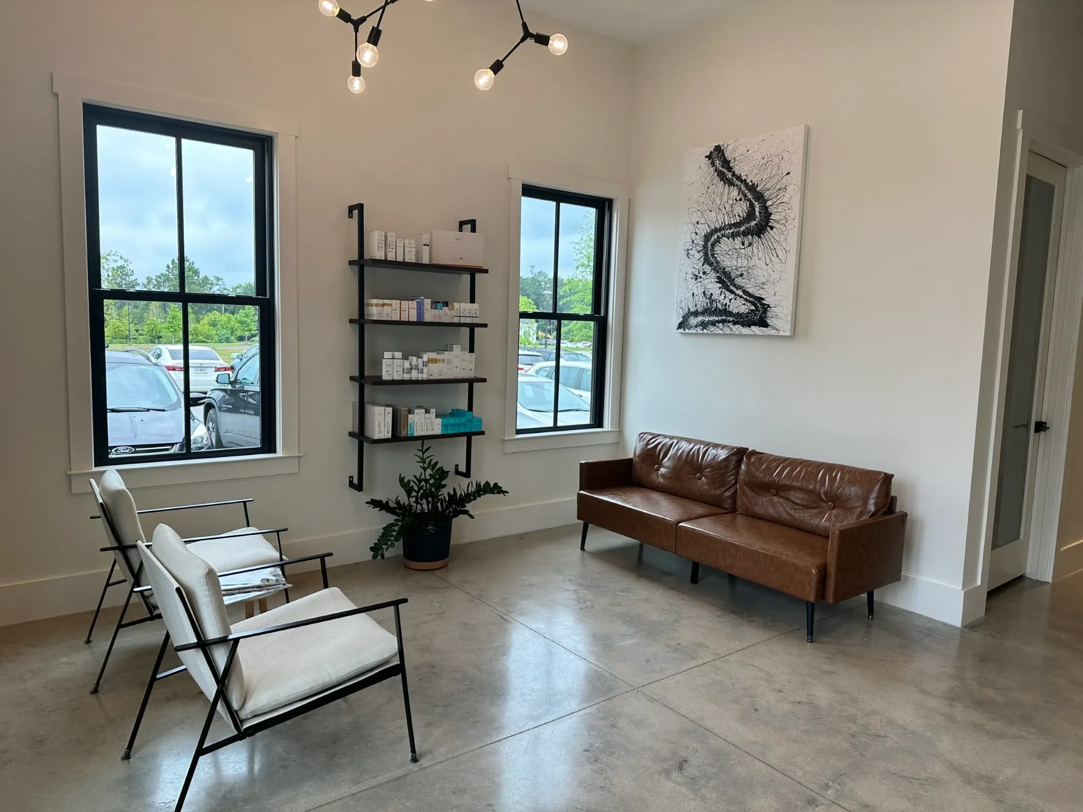 Clean, professional medical spa treatment room with neutral tones at Studio Aesthetics in Columbus