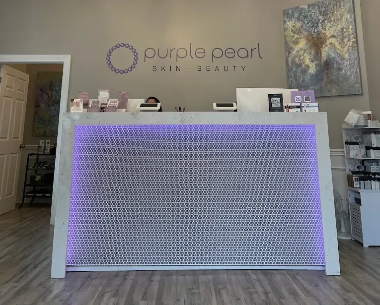 Clean, professional medical spa treatment room with neutral tones at Purple Pearl in New Albany