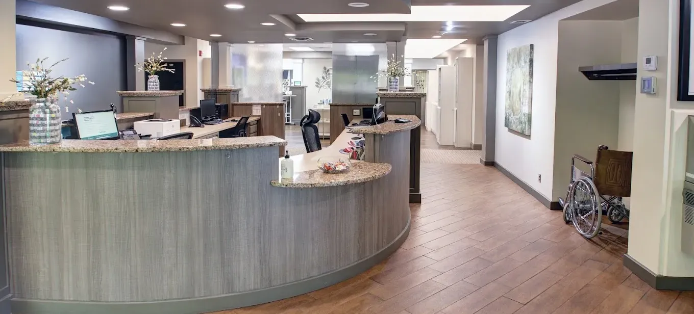 Clean, professional medical spa treatment room with neutral tones at Syracuse Plastic surgery in Syracuse