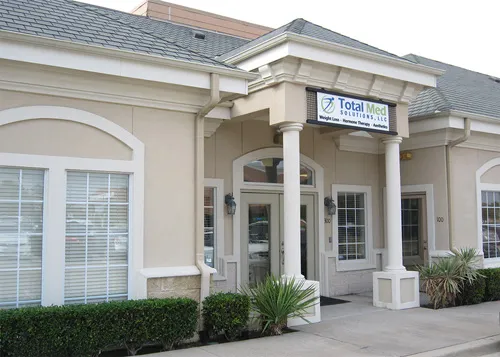 Clean, professional medical spa treatment room with neutral tones at Total Med Solutions - Plano in Plano