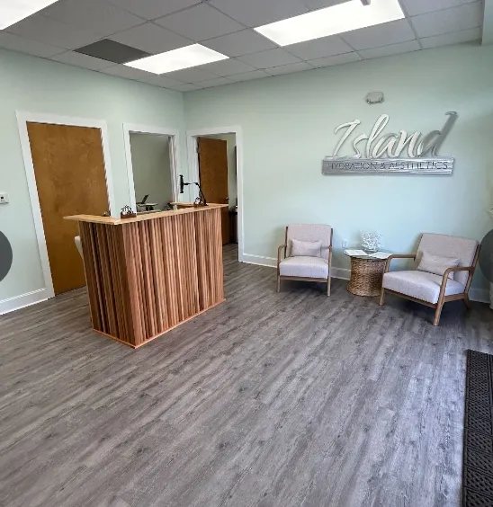 Clean, professional medical spa treatment room with neutral tones at Island Hydration and Aesthetics in Sneads Ferry