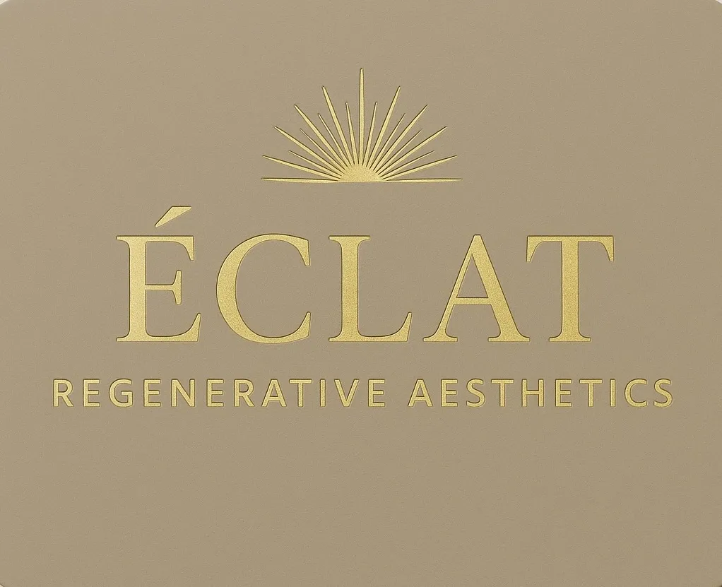 Clean, professional medical spa treatment room with neutral tones at Eclat Regenerative Aesthetics in Watsonville