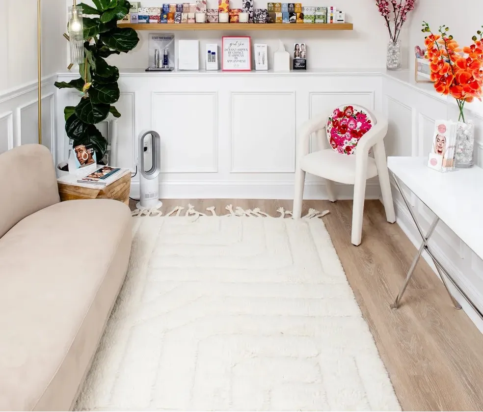 Clean, professional medical spa treatment room with neutral tones at Bella Bela Aesthetics in Sherborn
